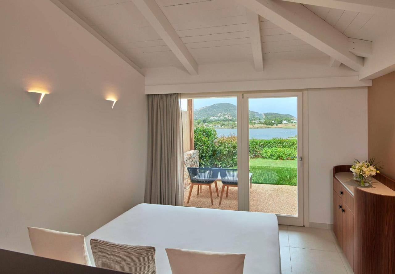 Baia Di Chia Resort Sardinia, Curio Collection By Hilton Esterno foto