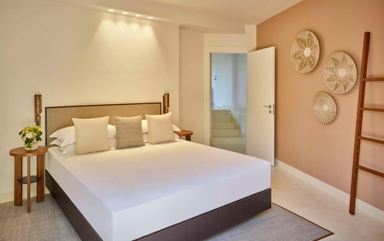 Baia Di Chia Resort Sardinia, Curio Collection By Hilton Esterno foto
