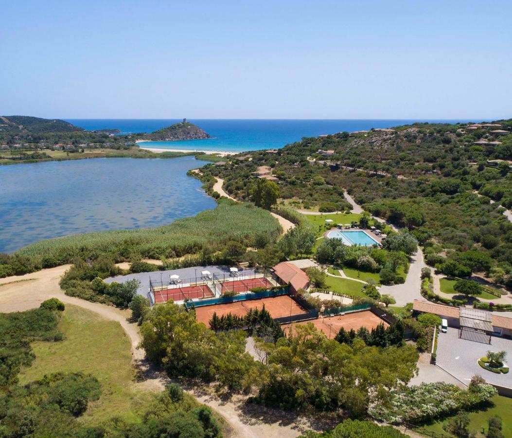 Baia Di Chia Resort Sardinia, Curio Collection By Hilton Esterno foto
