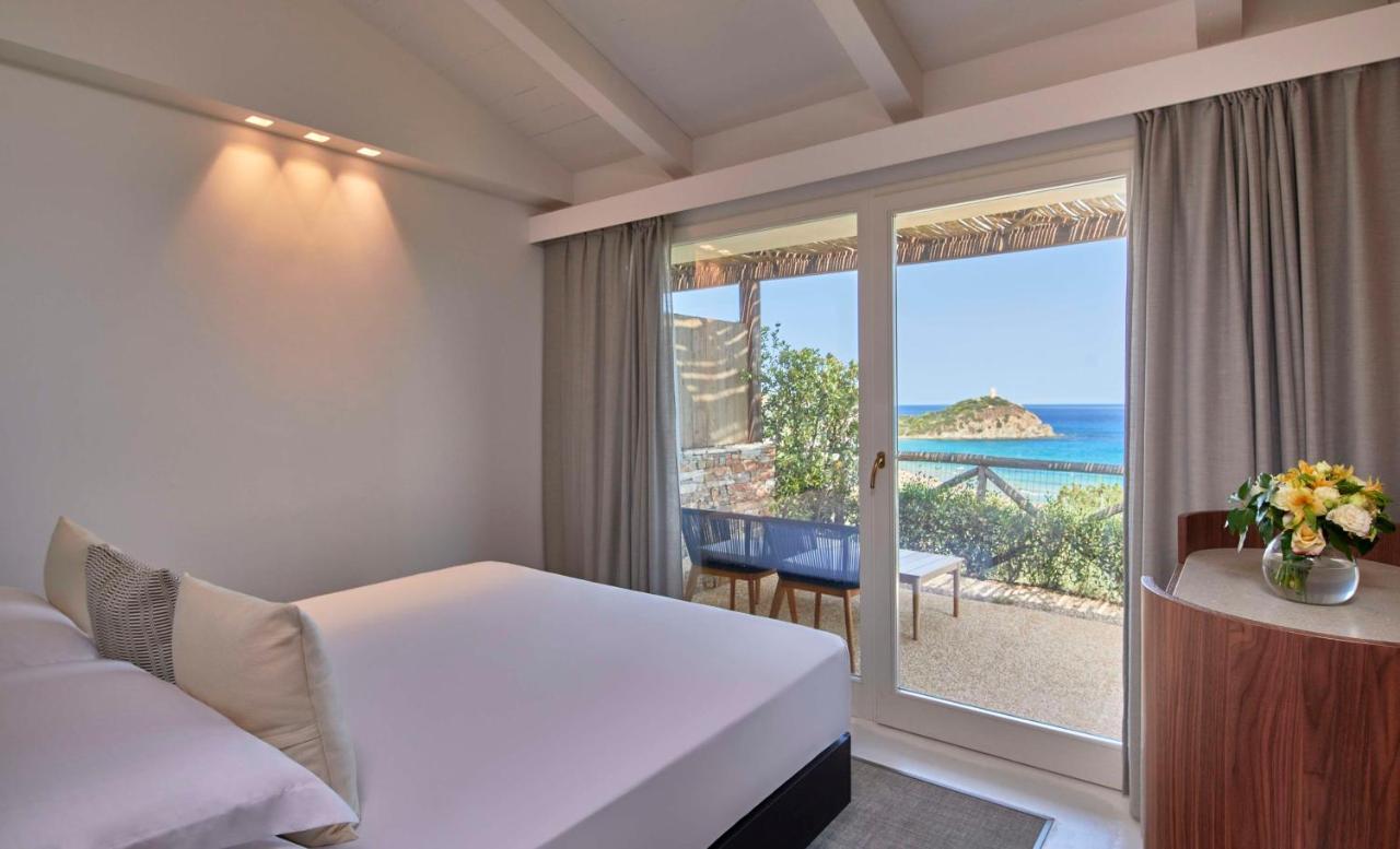 Baia Di Chia Resort Sardinia, Curio Collection By Hilton Esterno foto