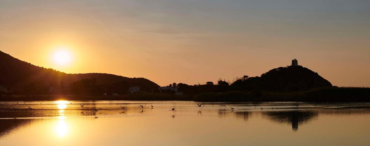 Baia Di Chia Resort Sardinia, Curio Collection By Hilton Esterno foto