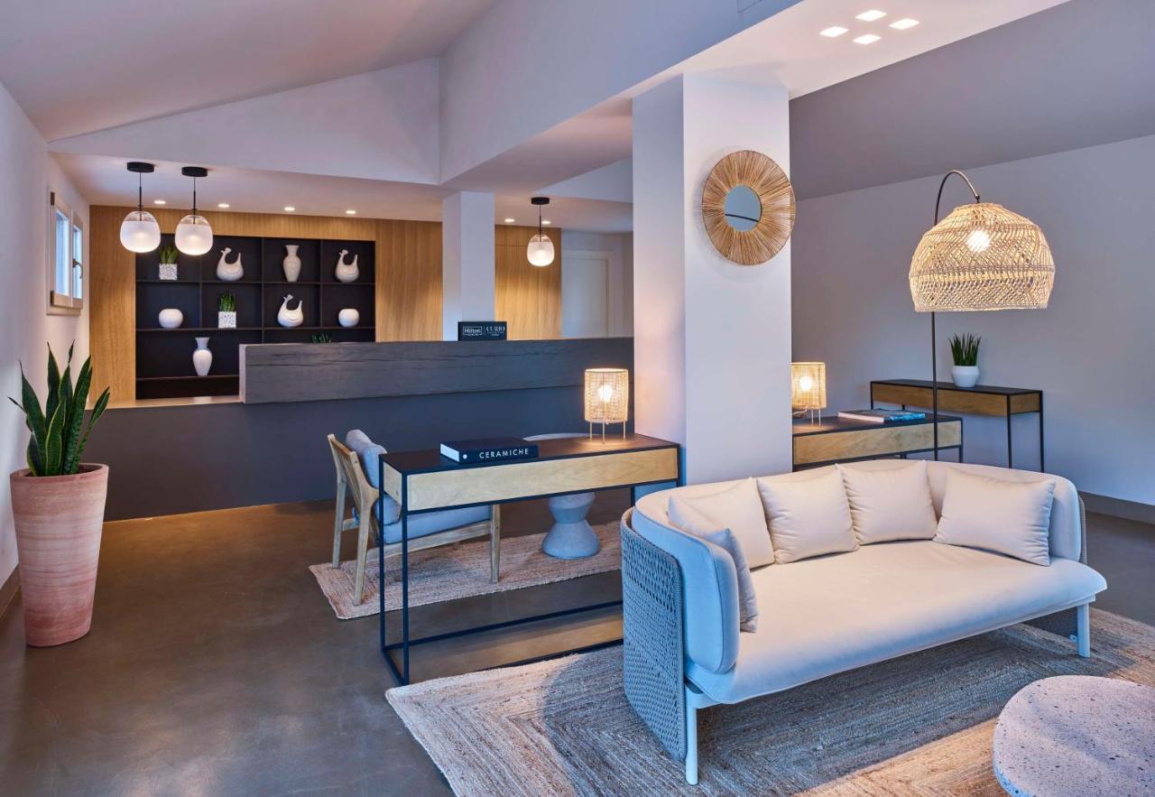 Baia Di Chia Resort Sardinia, Curio Collection By Hilton Esterno foto