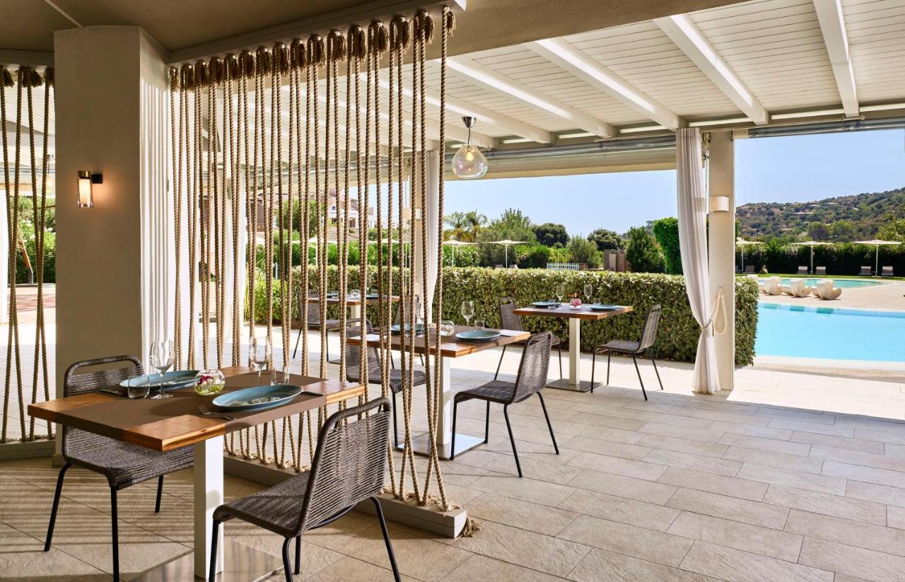 Baia Di Chia Resort Sardinia, Curio Collection By Hilton Esterno foto