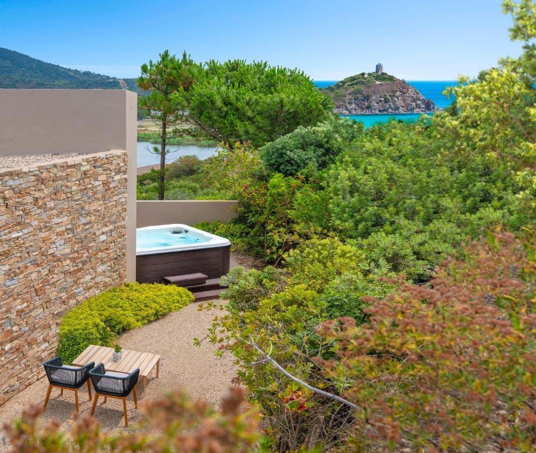 Baia Di Chia Resort Sardinia, Curio Collection By Hilton Esterno foto