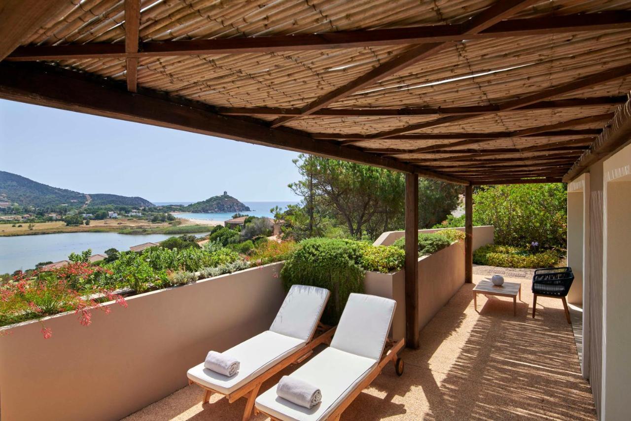 Baia Di Chia Resort Sardinia, Curio Collection By Hilton Esterno foto