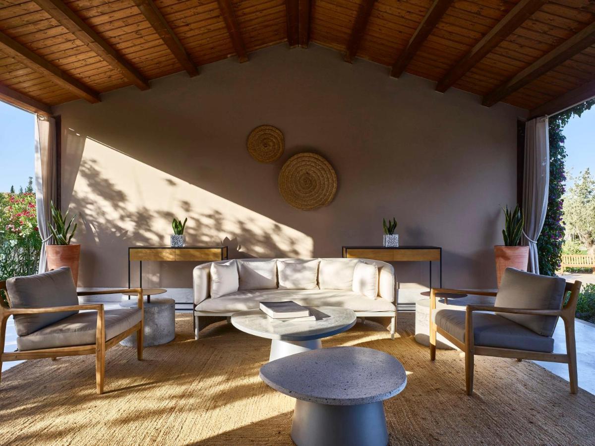 Baia Di Chia Resort Sardinia, Curio Collection By Hilton Esterno foto
