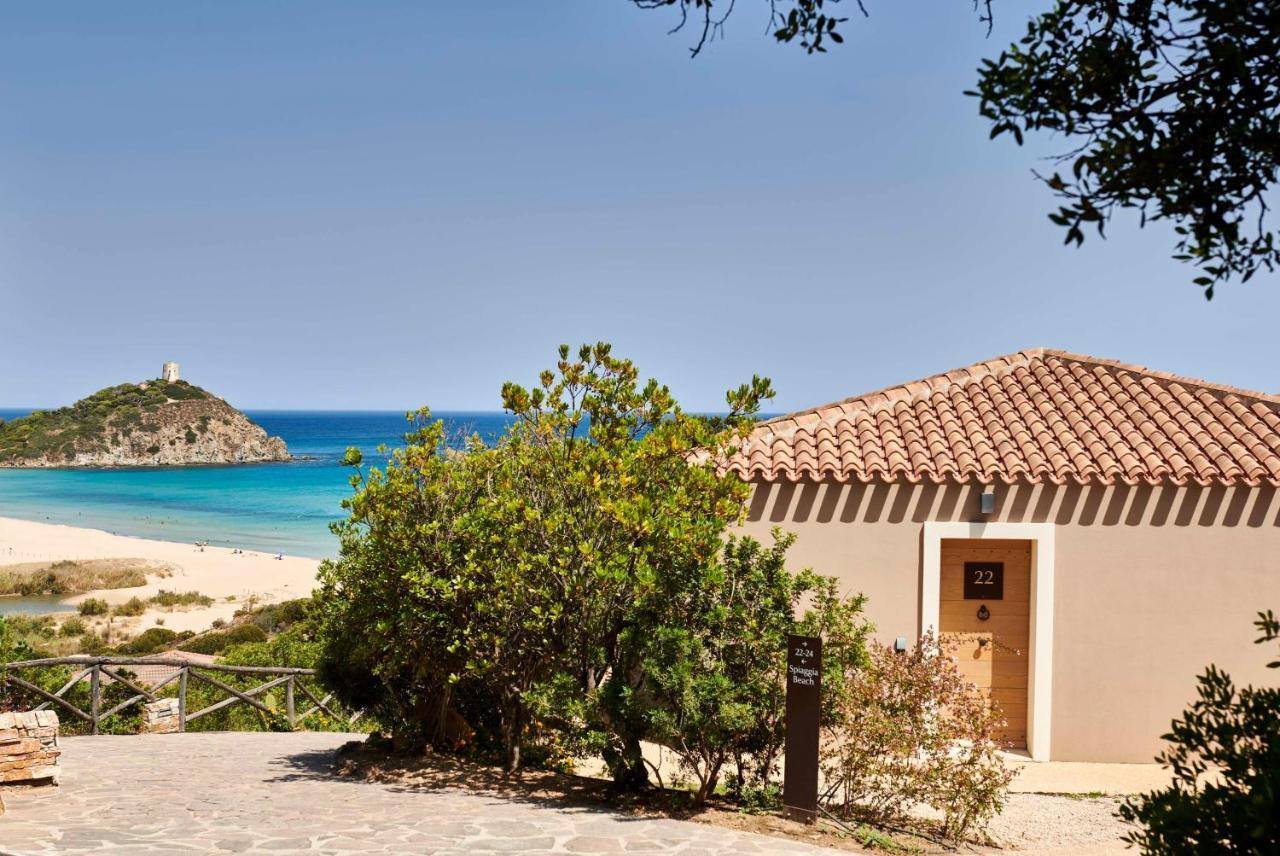 Baia Di Chia Resort Sardinia, Curio Collection By Hilton Esterno foto