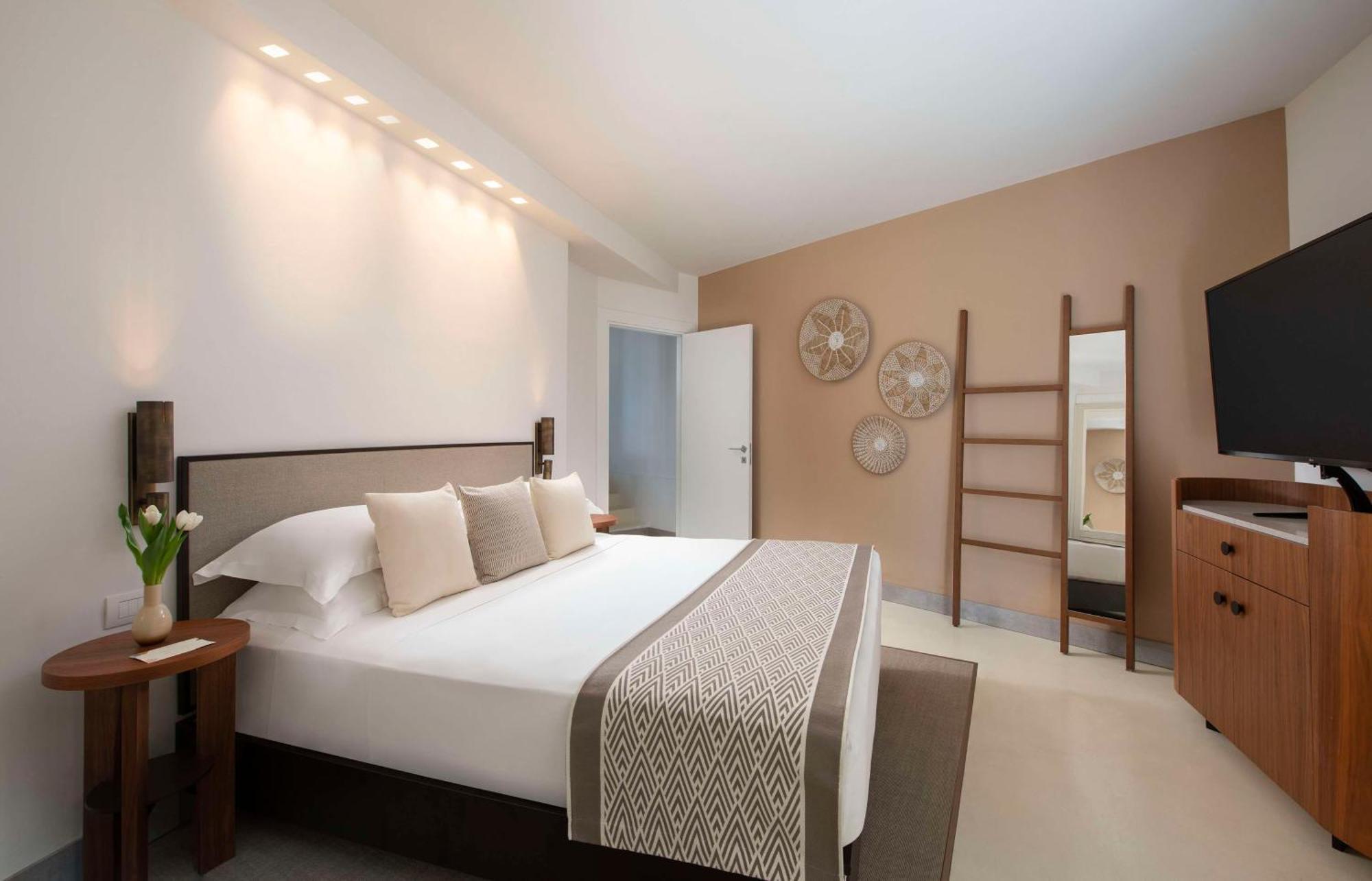 Baia Di Chia Resort Sardinia, Curio Collection By Hilton Esterno foto