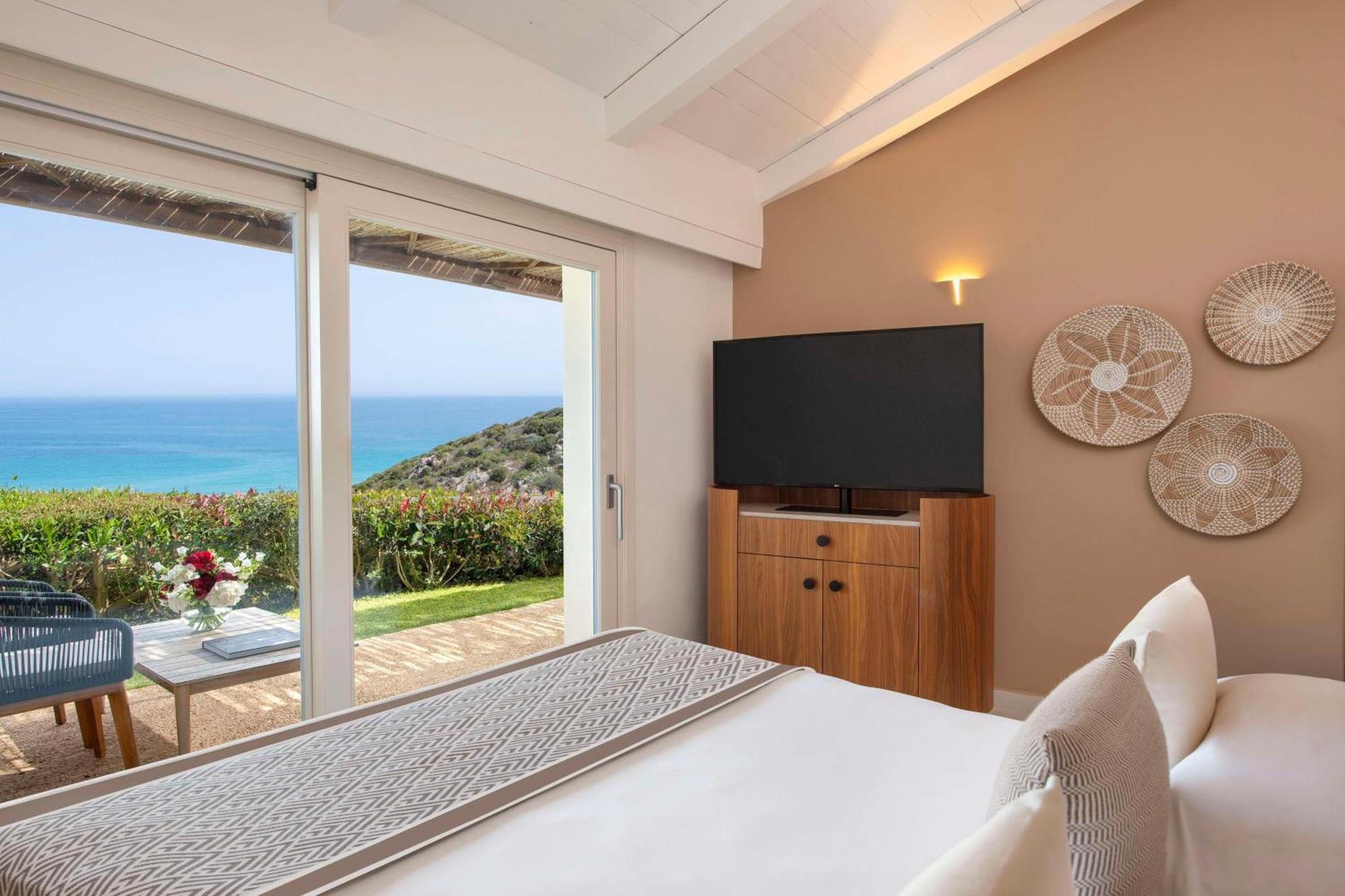 Baia Di Chia Resort Sardinia, Curio Collection By Hilton Esterno foto