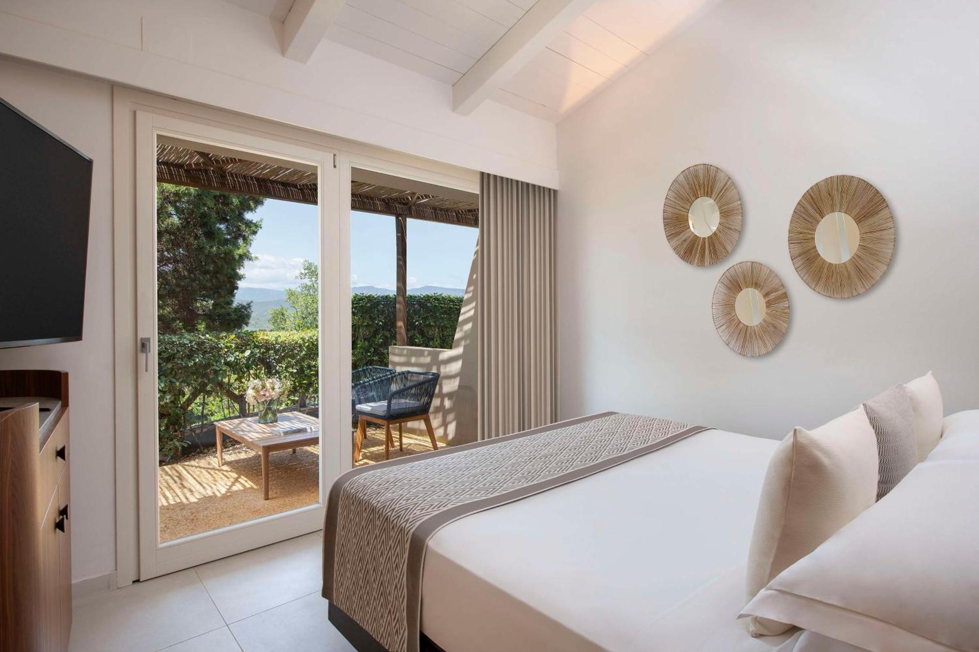 Baia Di Chia Resort Sardinia, Curio Collection By Hilton Esterno foto