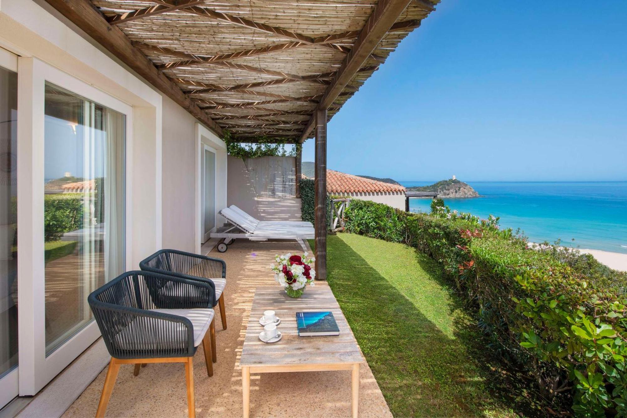 Baia Di Chia Resort Sardinia, Curio Collection By Hilton Esterno foto